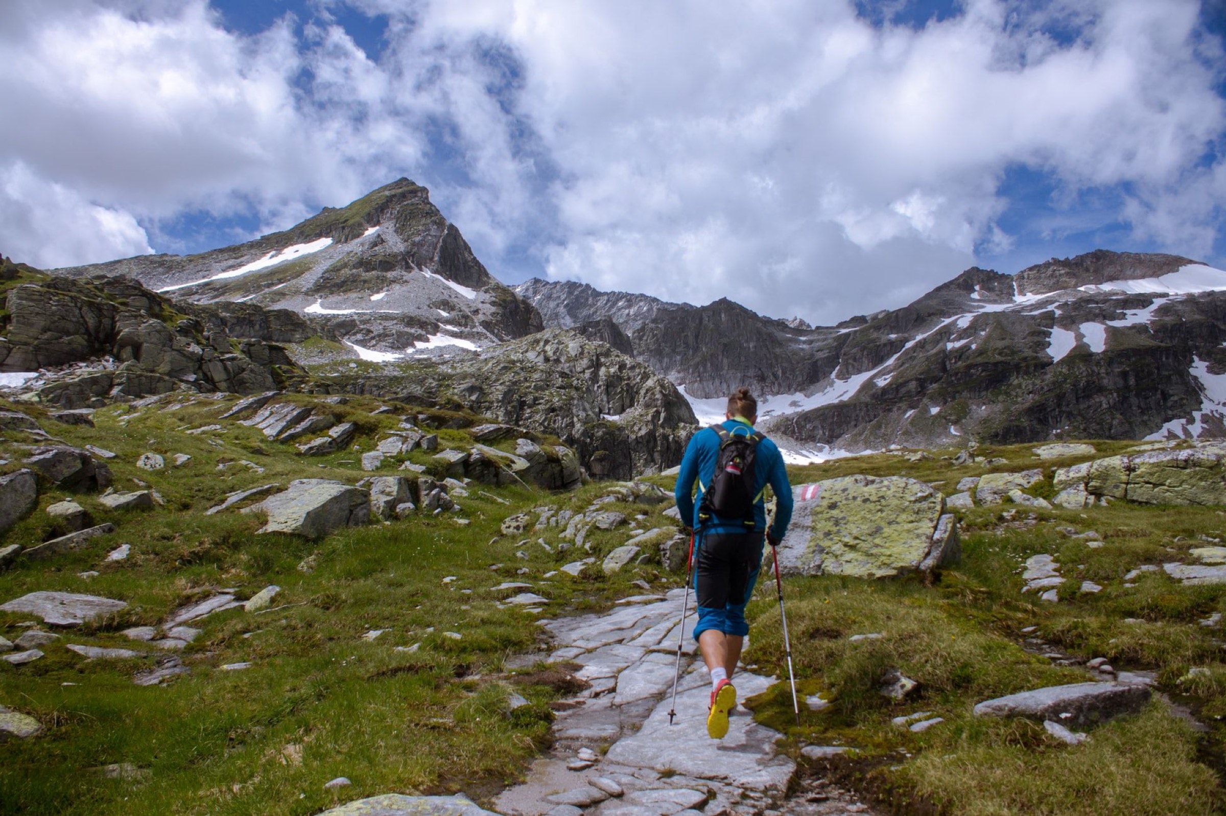 A hiker on a rocky trail high in the Carpathians